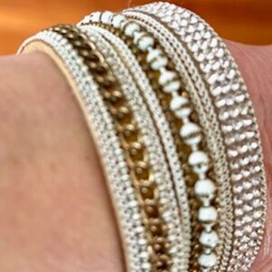 Multimedia women's bracelet with a row of sparkling stones & magnetic closure